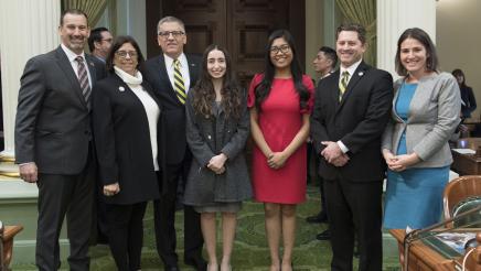 Asm. Aguiar-Curry poses with Cal Poly Students