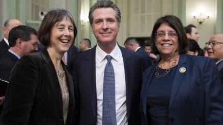 Asm. Aguiar-Curry poses with Gov. Newsom and Sen. Skinner