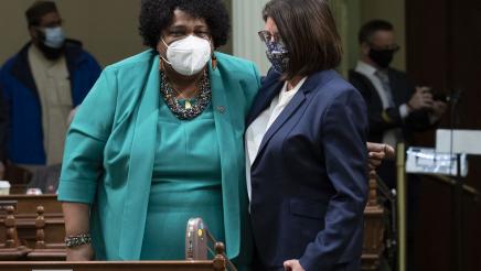 Asm. Aguiar-Curry shares a moment with her former Assembly colleague, incoming Sec of State Shirley Weber