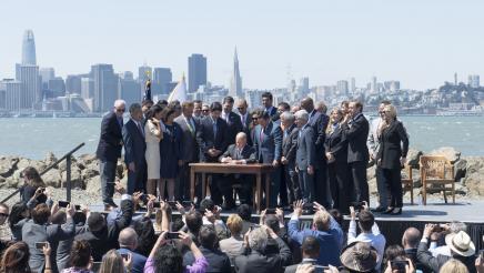 Asm. Aguiar-Curry joins other California political leaders to witness Gov Jerry Brown signing the Cap and Trade Bill, AB 398