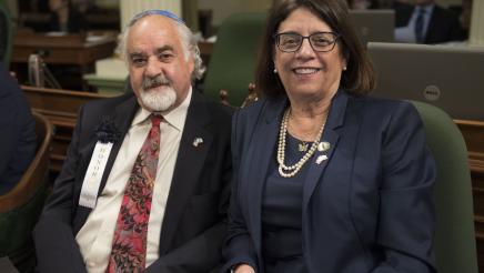 Asm. Aguiar-Curry sitting with an honoree at the 2018 Legislative Jewish Caucus' Holocaust Remembrance Brunch