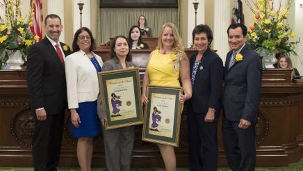 Asm. Aguiar-Curry poses with 2018 Woman of the Year Honorees Amagda Perez and Holly Cooper during the Woman of the Year Ceremony