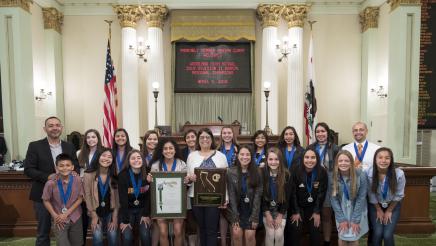 Asm. Aguiar-Curry poses with the 2018 NorCal Soccer Champion team from Woodland High School