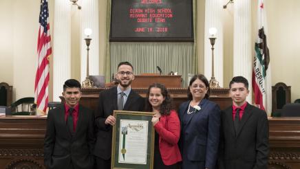 Dixon High School Migrant Education Debate Team with Assemblymember Aguiar-Curry