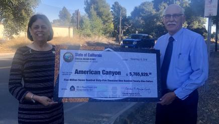 Assemblymember Aguiar-Curry presents check for $5,765,928 to Mayor Leon Garcia of American Canyon